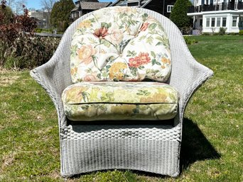 A Modern Wicker Arm Chair By Lloyd Loom