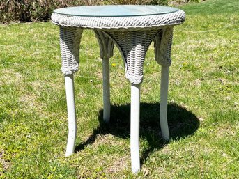 A Wicker Side Table With Glass Top By Lloyd Loom