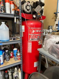 A Husky 60 Gallon Compressor - 135 Max PSI