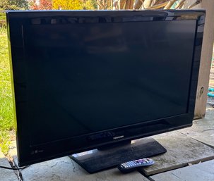 A Toshiba 37 Inch Flat Screen TV