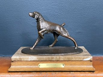 A Bronze Brittany Spaniel Sculpture On A Marble And Wood Base