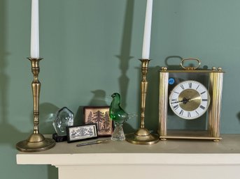 DECORATIVE LOT INCLUDES PAPERWEIGHTS, CANDLESTICKS, AND CLOCK