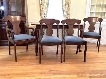 A Vintage Dining Table & Four Chairs In A Timeless, Elegant Style