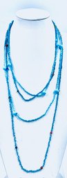 Two-strand Turquoise Tone Seed Bead Opera Length Necklace