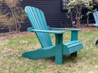 A Classic Adirondack Chair In Green