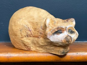 A Signed Hand Carved Pine Raccoon