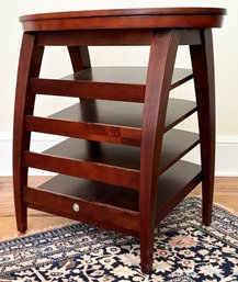 A Cherry Wood Magazine Rack And Side Table By Levenger