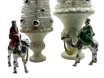 Pair Of White Tabletop  Bottlebrush Christmas Trees With Silver Ornaments & 2 Wisemen On Camels In Plastic