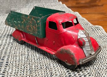 An Antique Tin Toy Dump Truck