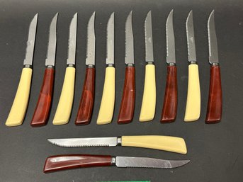 A Set Of Twelve Vintage Quik-Cut Steak Knives