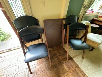 A CARD TABLE W/ FOLDING CHAIRS