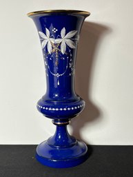 A LARGE ANTIQUE ENAMELED COBALT GLASS VASE