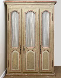 A French Provincial Cabinet With Boiserie Panels And Grille Work Doors By Lillian August