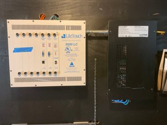 A LiteTouch And Lutron Lighting Control Panels