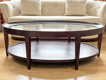 A Modern Coffee Table - Oblong With Glass Top And Shelf Below