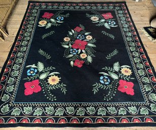 A Vintage Hooked Rug In Beautiful Floral Pattern