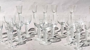 A Large Set Of Hand Blown Glassware