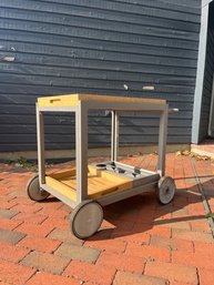 A Teak And Metal Patio Cart