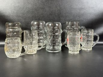 An Assortment Of Beer Mugs In Clear Glass From Germany