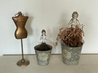 Painted Metal Pots And Bisque Doll Forms