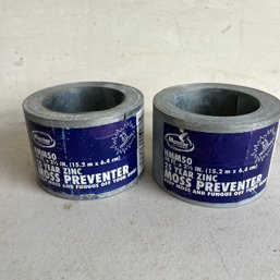 A Pair Of Rolls Of Zinc Moss Preventer