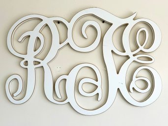 A Scrolled Wood Monogram - RJE