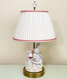 A Vintage Porcelain Lamp On Brass Base
