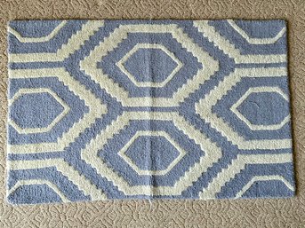 A Geometric Wool Carpet By Safavieh