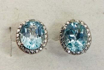 STUNNING STERLING SILVER FACETED BLUE TOPAZ SINGLE DIAMOND ACCENT STUD EARRINGS