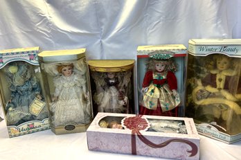 Grouping Of Six Porcelain Dolls Still In Boxes