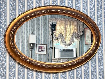 A VIntage Gilt Framed Oval Mirror