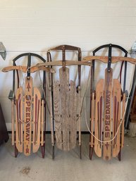 Three Vintage Sleds.