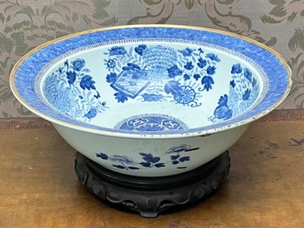 An Antique Chinese Bowl With Gilt Rim On Rose Wood Base