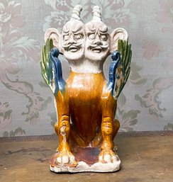 An Asian Mythological Glazed Ceramic Scukpture