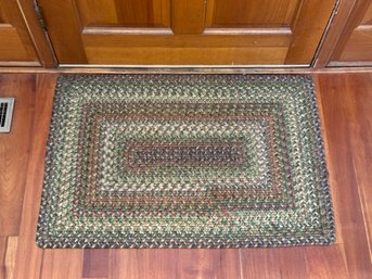 A Traditional Vintage Braided Wool Mat, Rectangular, In Autumnal Tones