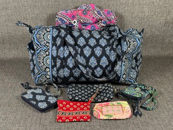 A Pretty Assortment Of Vera Bradley Bags & Wallets