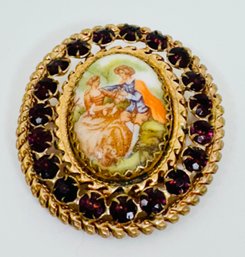 VINTAGE GOLD TONE COURTING MAN AND WOMAN PURPLE RHINESTONE BROOCH