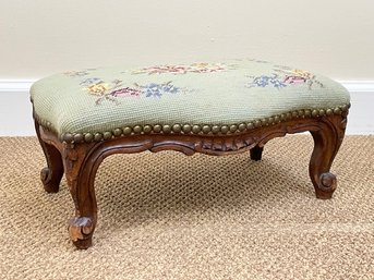 A Petite Footstool With Needlepoint Top And Nailhead Trim