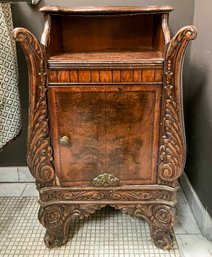 An Antique Carved Mahogany Nightstand