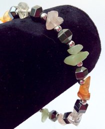 BRACELET WITH SEMIPRECIOUS STONES: 7.5 Inches In Length, Black, Pink, Green, White Clear, Orange Stones
