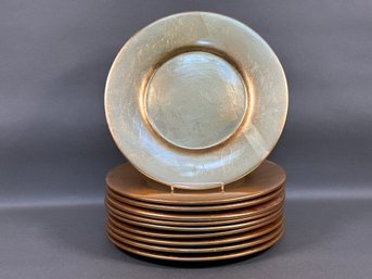 A Set Of Elegant Gold Ceramic Chargers By Pier 1