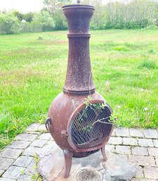 A Vintage Cast Iron Chiminea