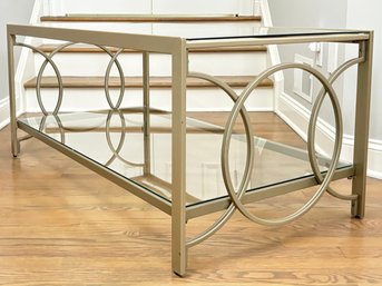 A Modern Geometric Metal And Glass Coffee Table With Shelf Below