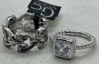 Pair Of GUESS COLLECTION STERLING SILVER RINGS- Cushion Cut Topaz And Interlocking Hearts