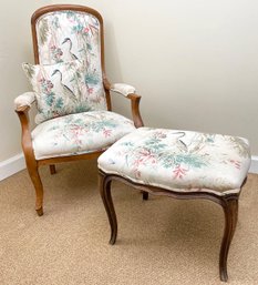 A Vintage Fauteuil And Footstool In Exotic Bird Print Chintz
