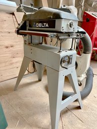 A Delta 18' Drum Sander - With Precut Abrasive Strips In Boxes