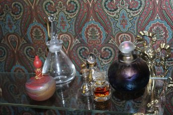 2 Shelves Of Small Perfume Bottles And Other Knick Knacks