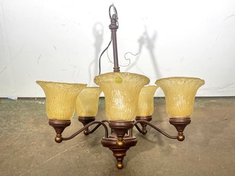 A Vintage Bronze And Frosted Glass Chandelier