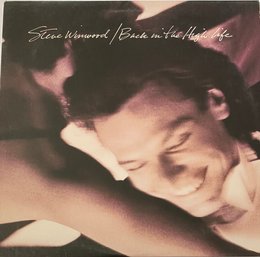 STEVE WINWOOD - *BACK IN THE HIGH LIFE* - LP RECORD - 1-25448 - {1986} - INNER SLEEVE - VG COND.