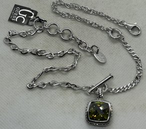 Striking GUESS COLLECTION STERLING SILVER NECKLACE- Ornate Pendant With Highly Faceted Peridot